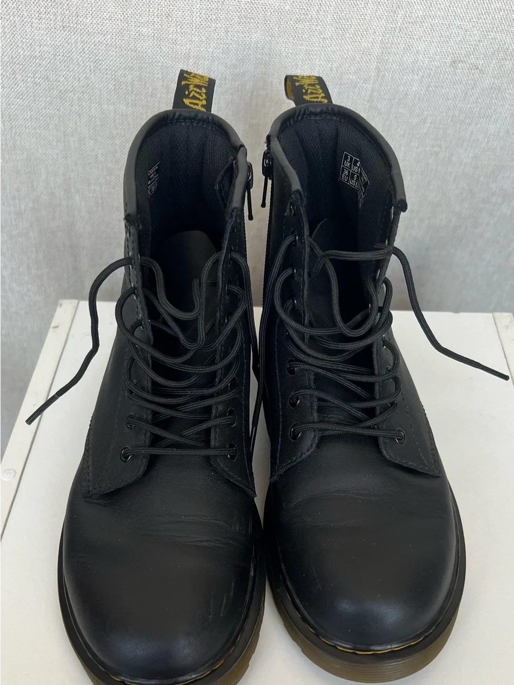 Dr. Martens Black Leather 8-Eye Lace-Up Boots with Yellow Stitching